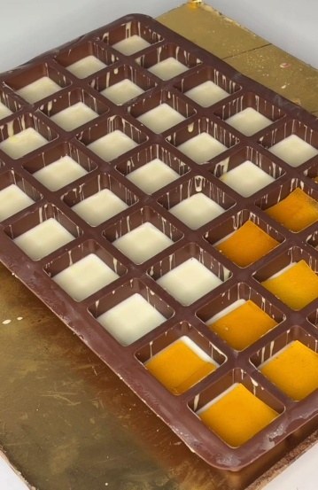 Mango and white chocolate setting in the mould
