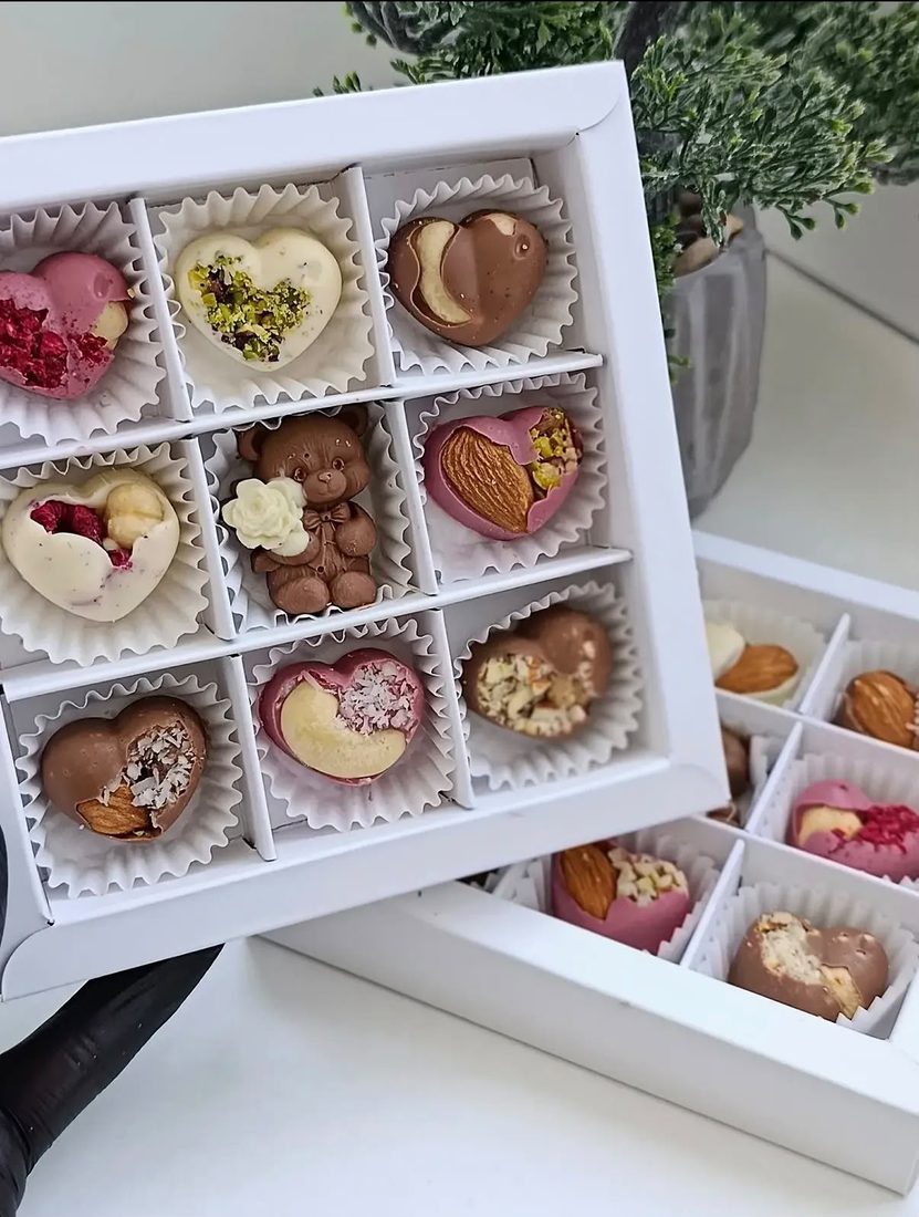 Customised bites topped with nuts, rose petals and dried fruit